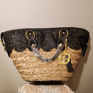 IMAN Straw pocketbook with leather trim.